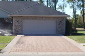Residential brick paver driveway installation