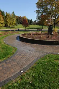 Vertical view of the same Rockford College paver plaza and sundial monument